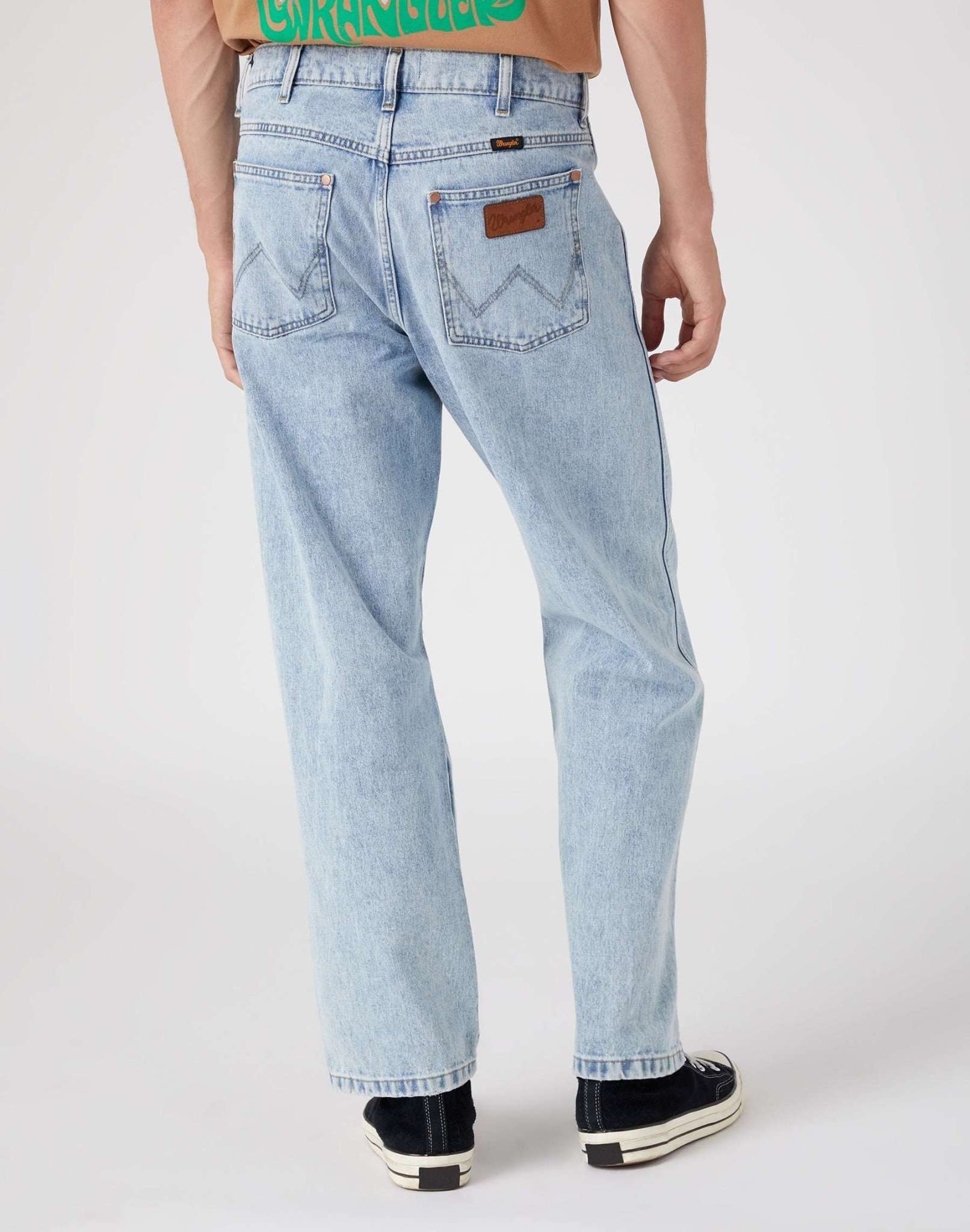 Redding in Ripped Light Wash Jeans Wrangler   