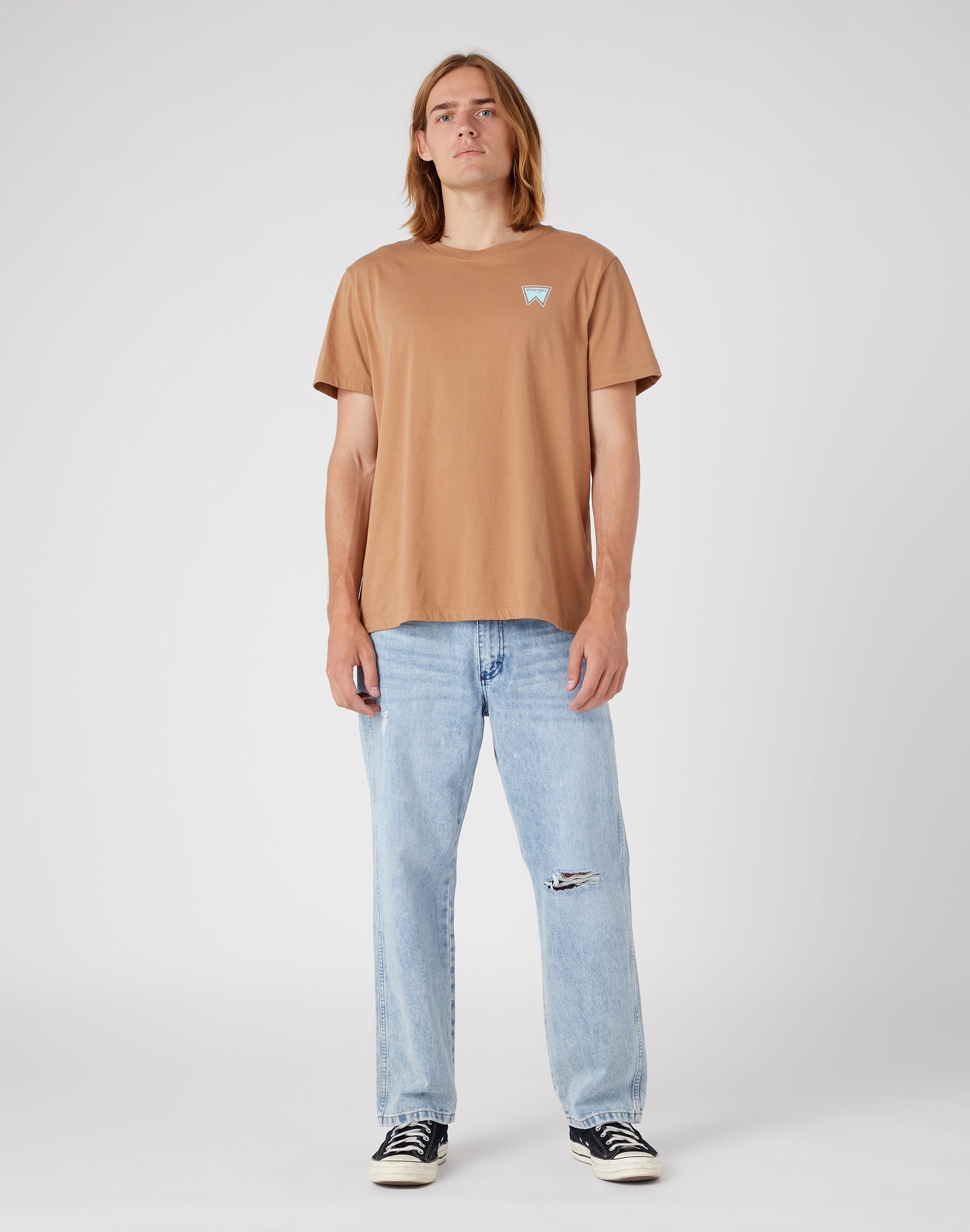 Redding in Ripped Light Wash Jeans Wrangler   