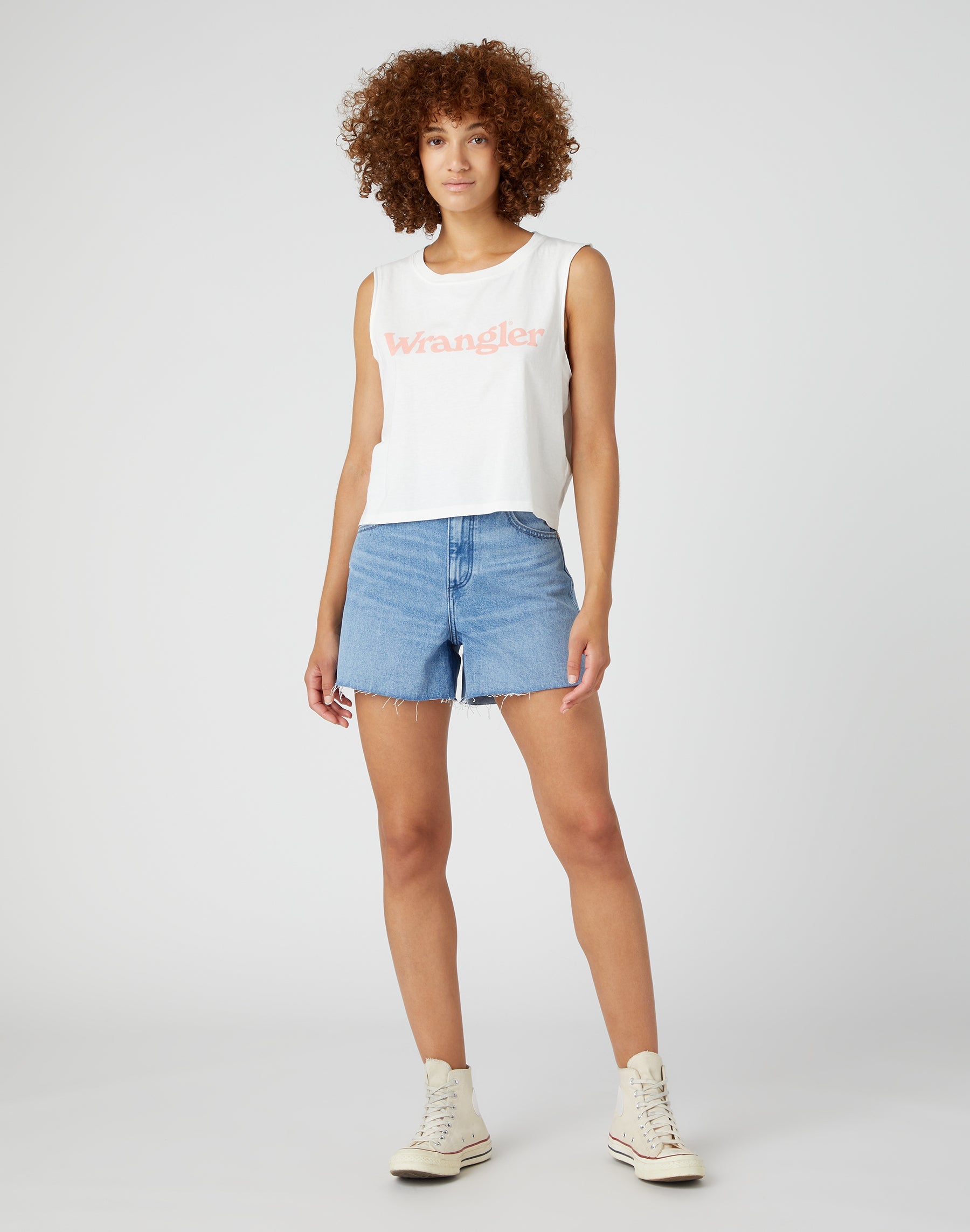 Donna in Lost Control denim shorts Wrangler   